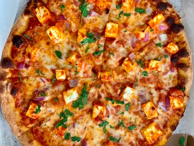 Butter Chicken Pizza from Chicago Pizza and Pasta in Irving, Texas